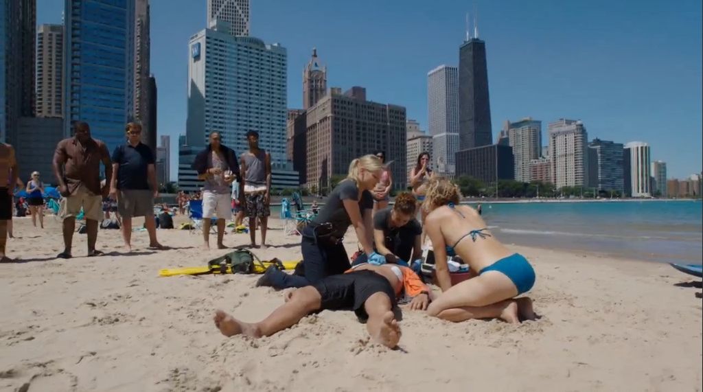 Kids playing in the sand at Ohio Street Beach