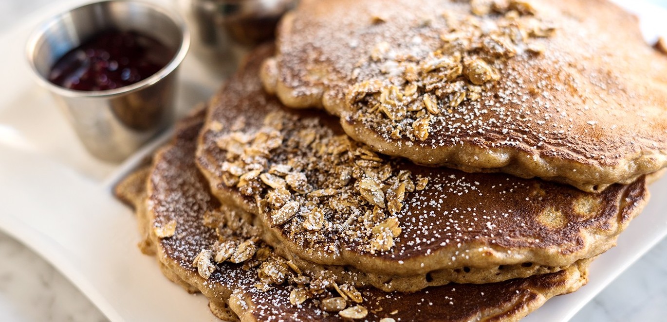 Pancakes and jam served at Bakin’ & Eggs