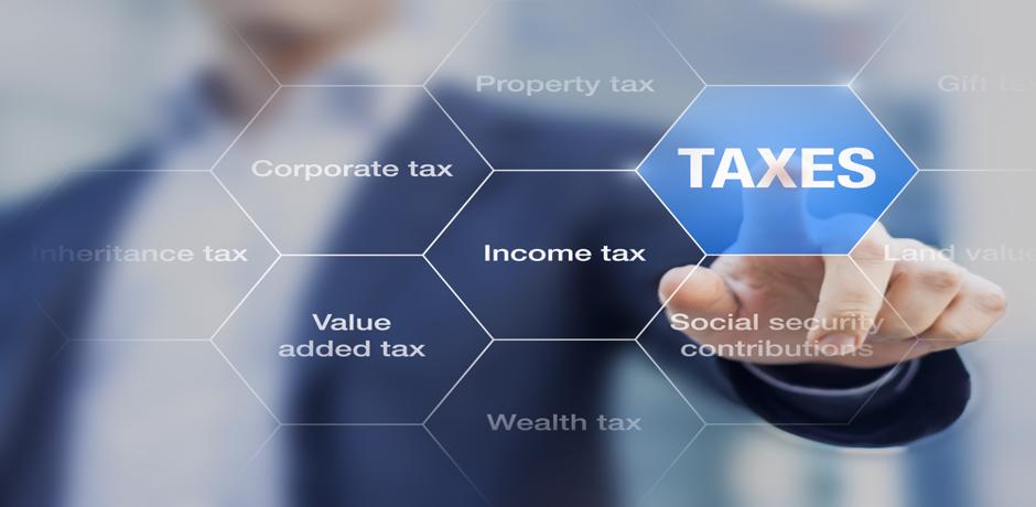 Business man touching a honeycomb digital pattern with the word Taxes