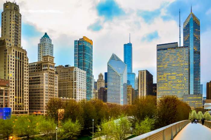 Chicago downtown skyline in the evening seen from pedestrian bridgeway