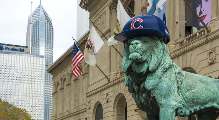Lion Statue with Chicago Cubs hat. The statue is one of a pair of bronze lions that flank the main entrance of The Art Institute of Chicago.