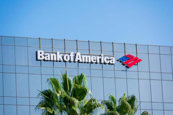 Bank of America sign and trademark logo on glass facade of BofA Financial Center tower building - Los Angeles, California